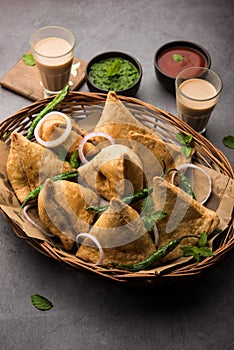 SamosaÂ Snack is an Indian deep fried pastry with a spiced filling usually made with potatoes, spices and herb